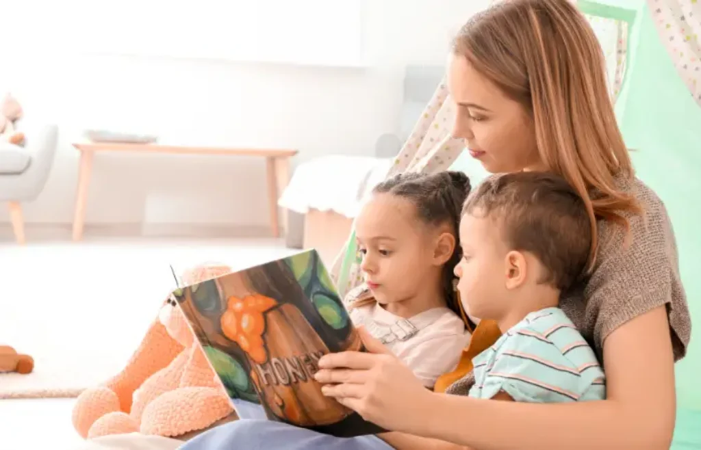 Woman reading with her children